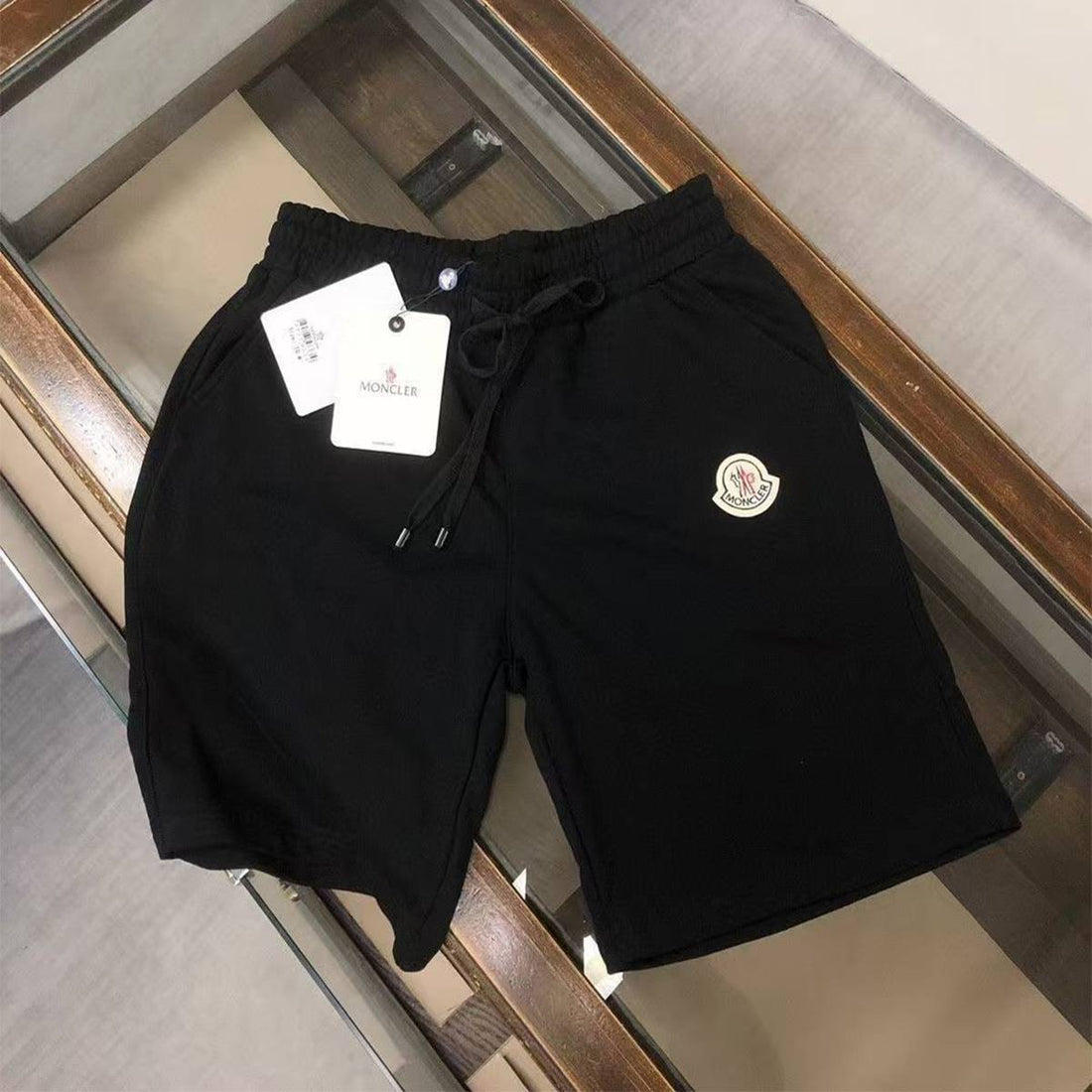 Black and white relaxed-fit quick-dry five-quarter shorts