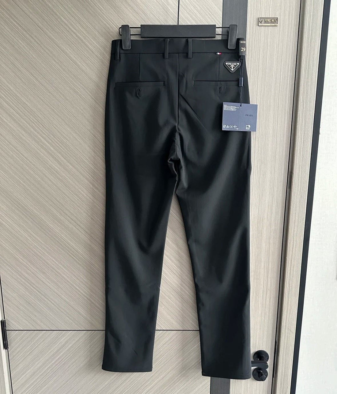 Black tailored dress trousers in smooth silk-blend fabric