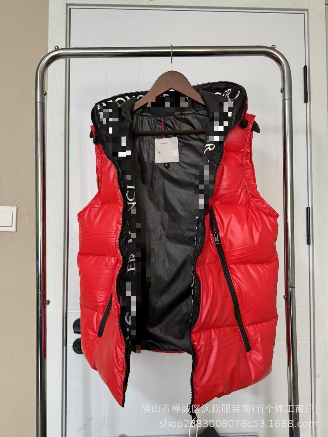 Black quilted nylon puffer jacket with hood and front zipper