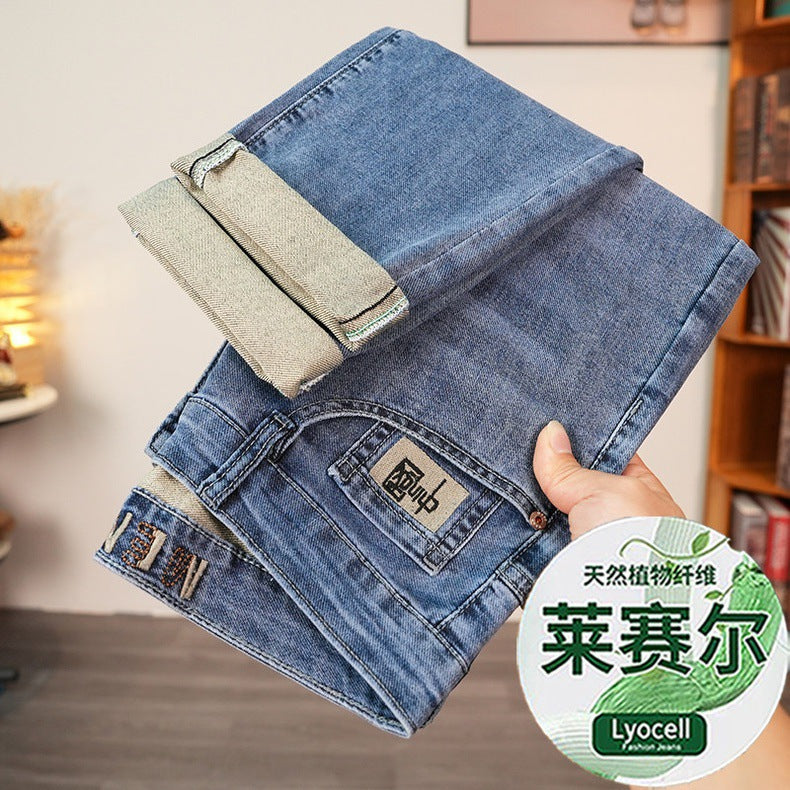 Lightweight stretch denim jeans with slim fit and tapered leg