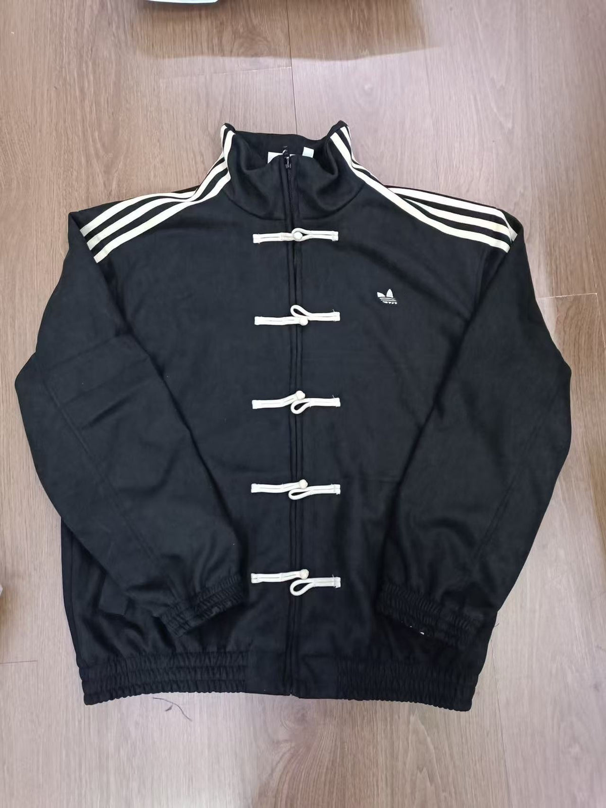 Ad Originals men's Chinese-inspired track jacket with stand collar and frog closures