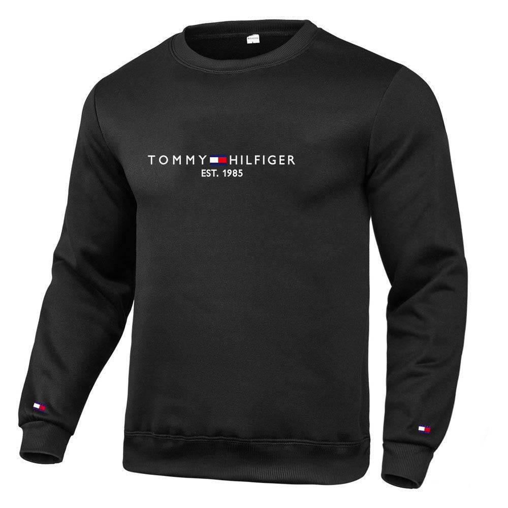 Black crewneck sweatshirt with textured knit and relaxed fit