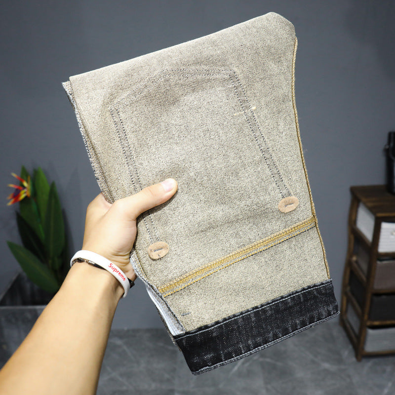Slim-fit gray denim shorts with embroidered details