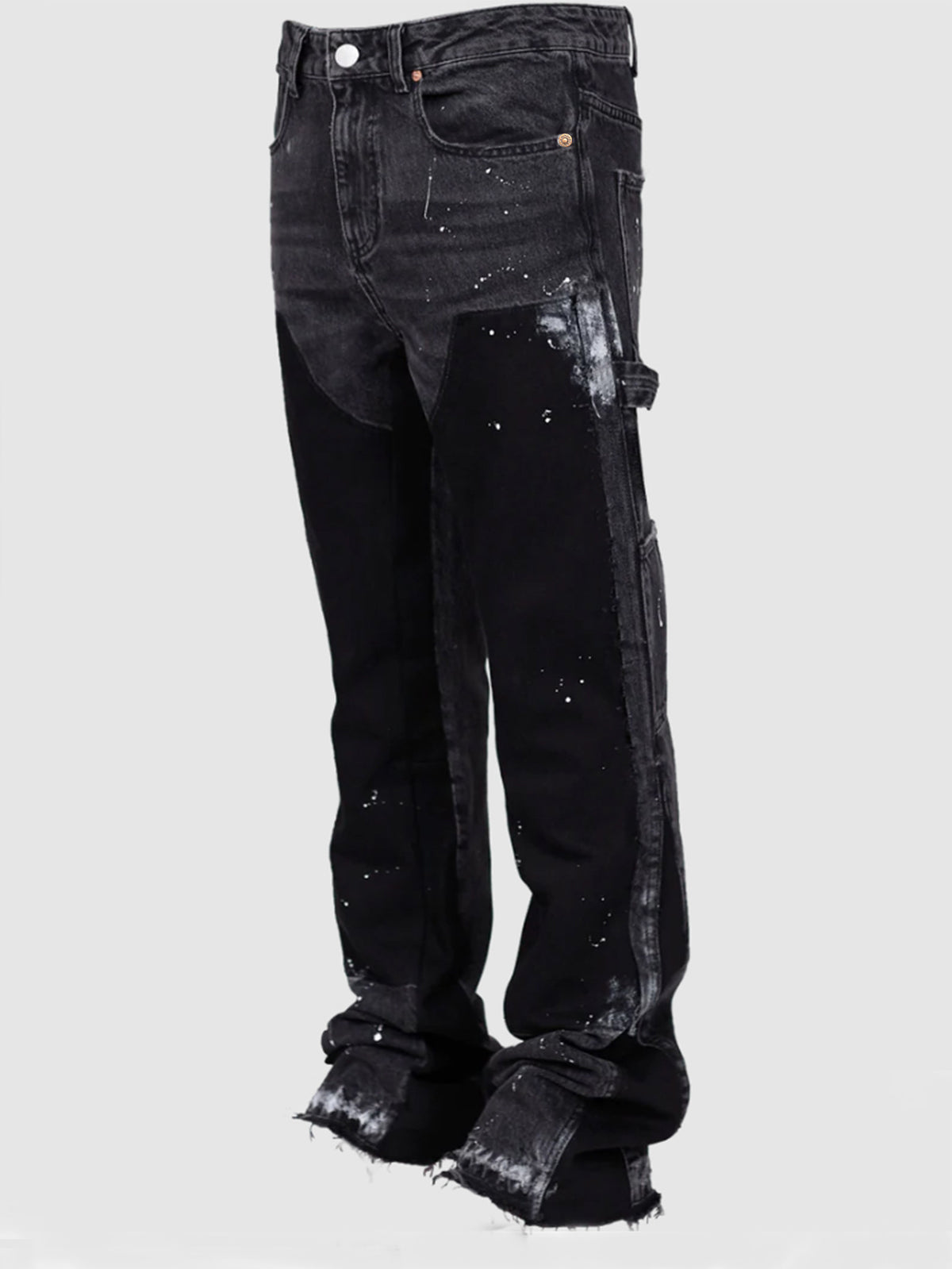 Distressed patchwork flare jeans with paint-splatter detailing