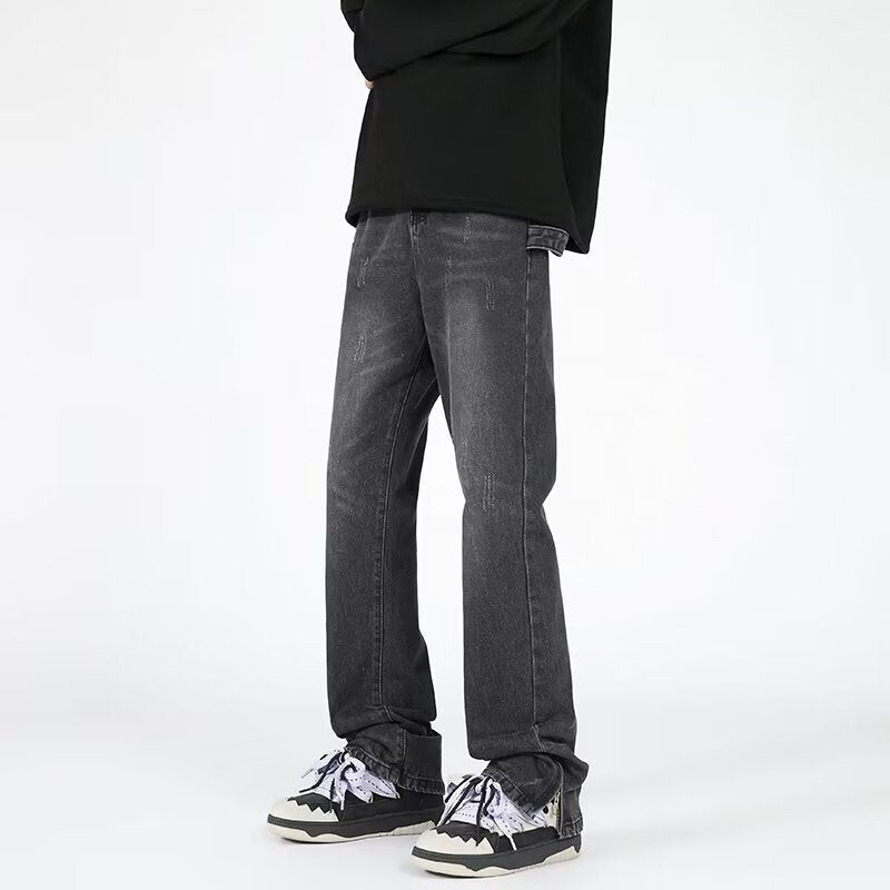 Black distressed wide-leg jeans with side zipper