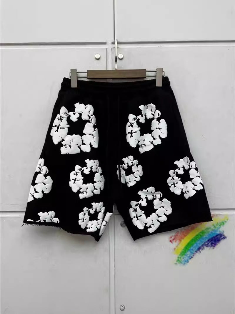 Classic gray cotton sweat shorts with 3D floral appliqué