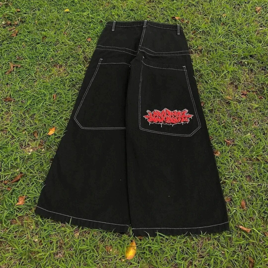 Baggy denim jeans with embroidered back pocket graphics