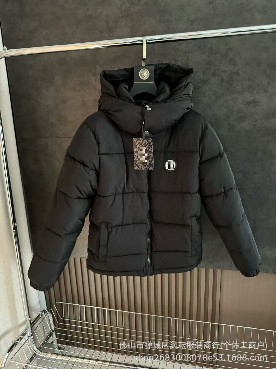 Black Nylon Puffer Jacket with Detachable Hood and Quilted Windproof Construction