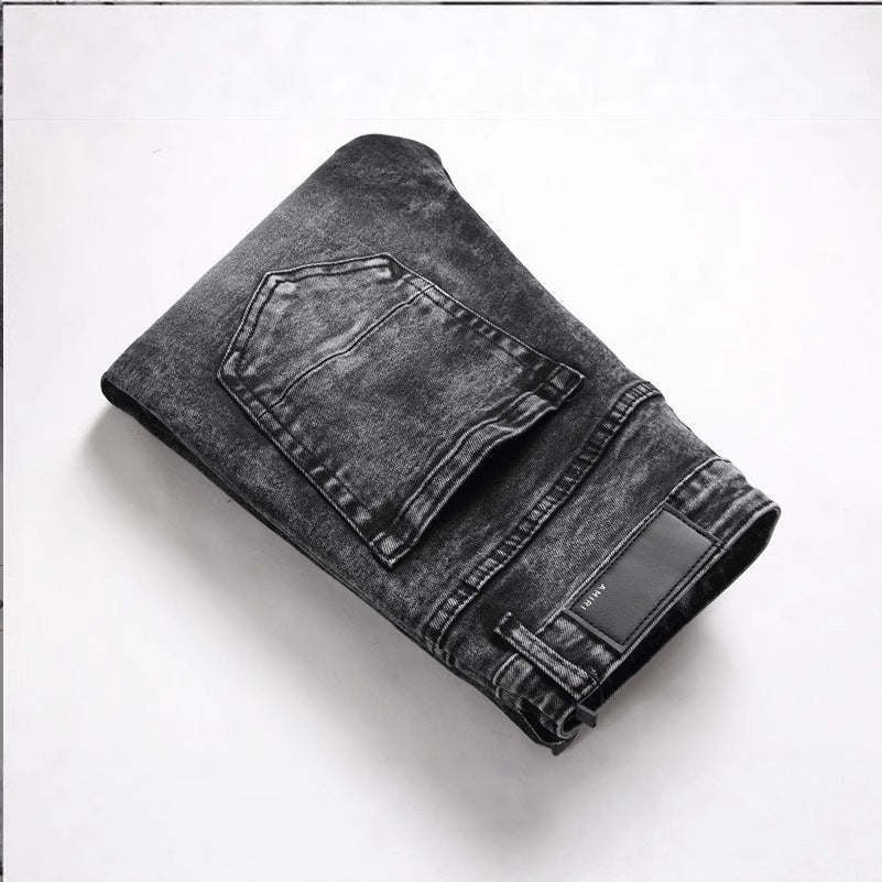 Black distressed jeans with white angel graphic