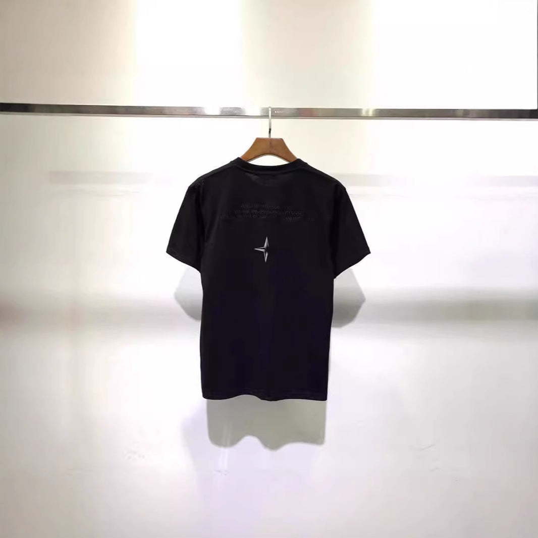 Crew-neck short-sleeve cotton T-shirt with embroidered star motif and reflective thread detail