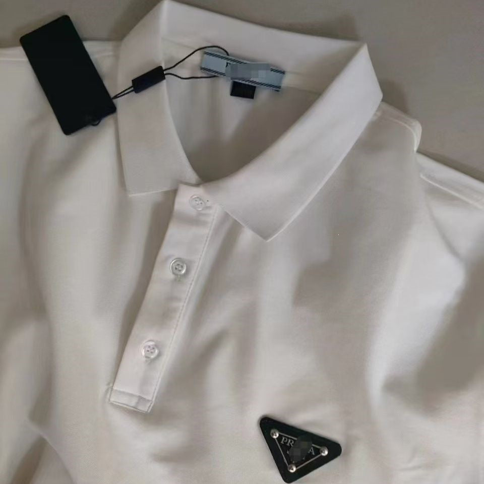 Black or white short-sleeve polo shirt with ribbed collar and half-placket