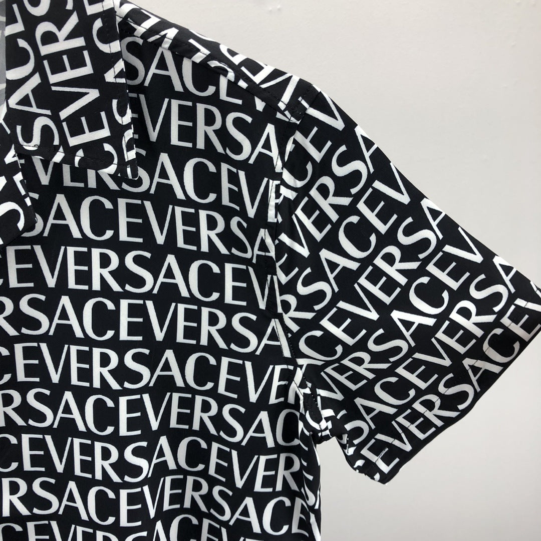 Short-sleeve black-and-white geometric print shirt