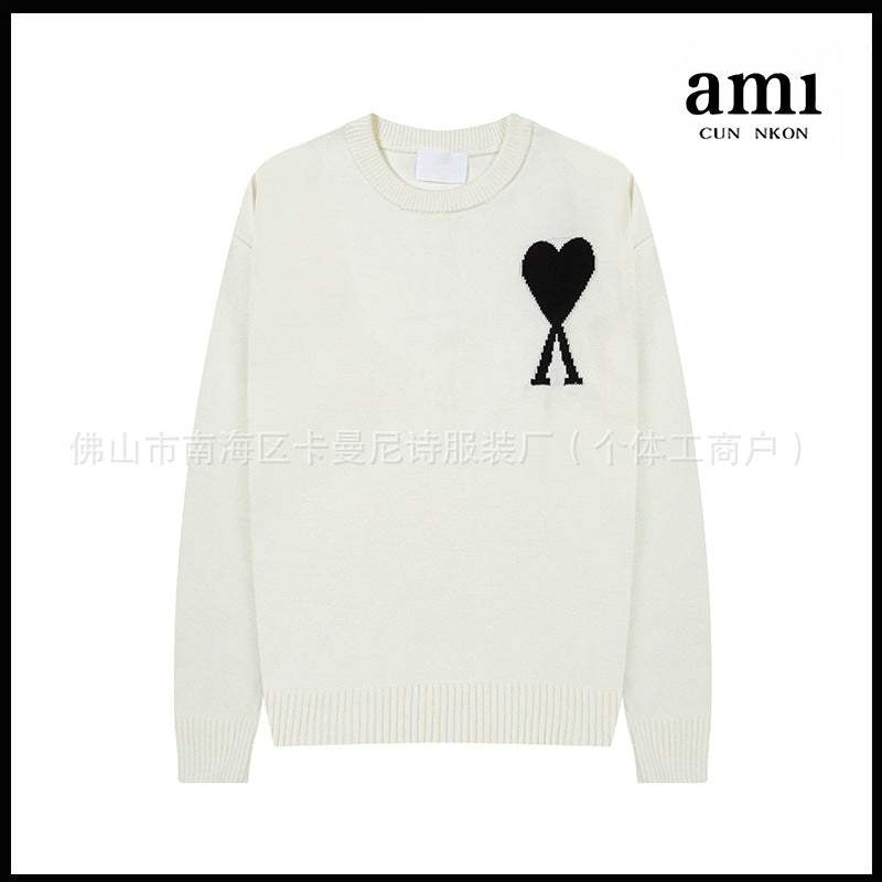 Black knit cardigan with red heart-balloon intarsia motif