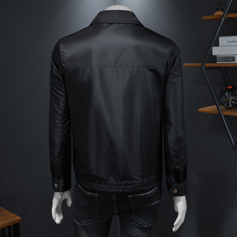 Black zip-front utility jacket with notched lapel and multiple pockets