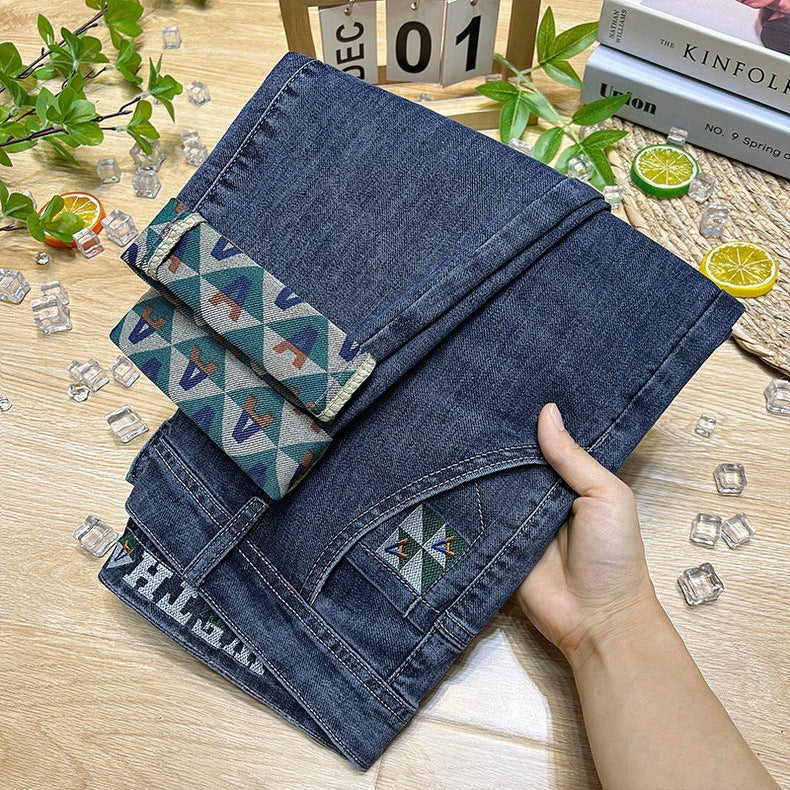Lightweight stretch denim jeans with slim fit and tapered leg