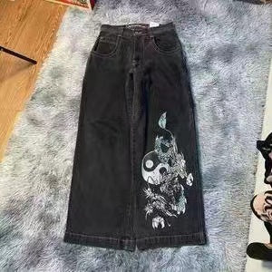 Baggy denim jeans with embroidered back pocket graphics