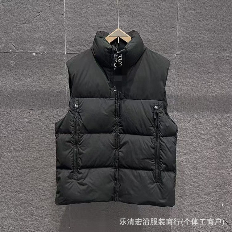 Ribbed Black Puffer Vest with Diagonal Zipper and Stand Collar