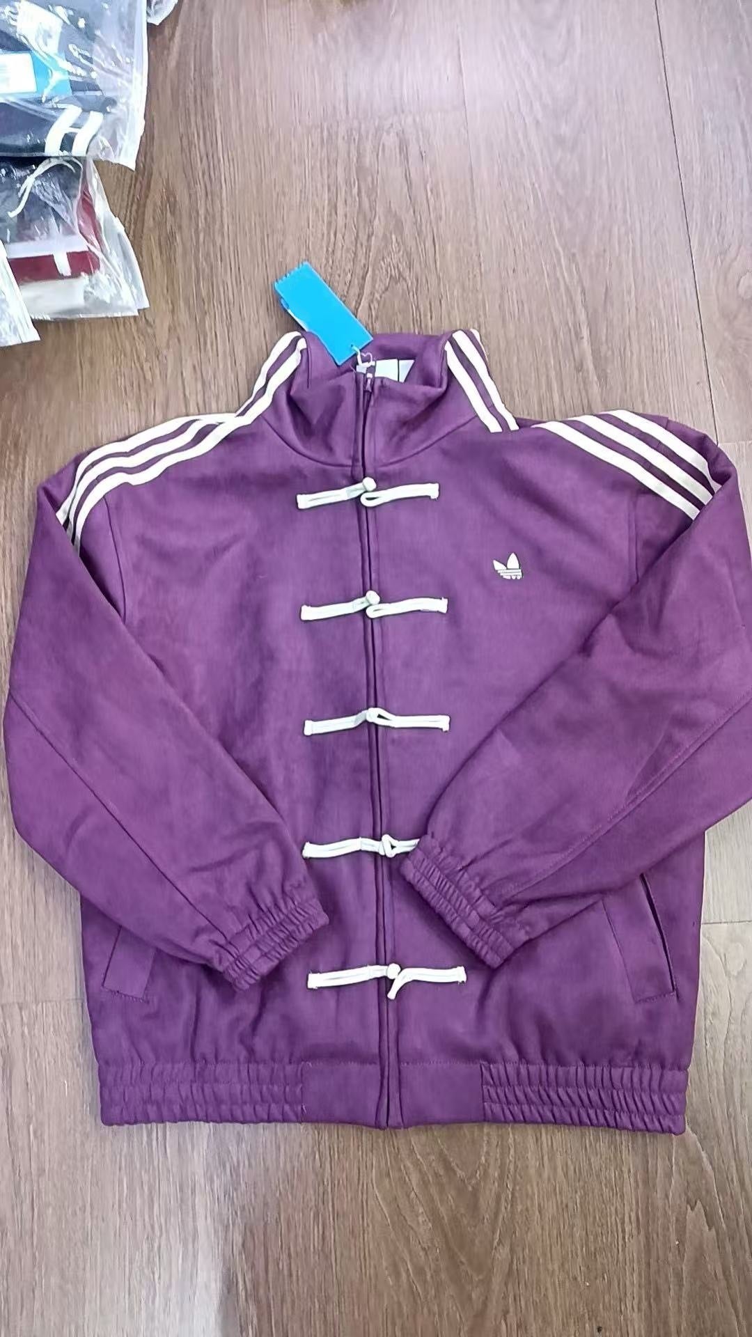 Ad Originals men's Chinese-inspired track jacket with stand collar and frog closures