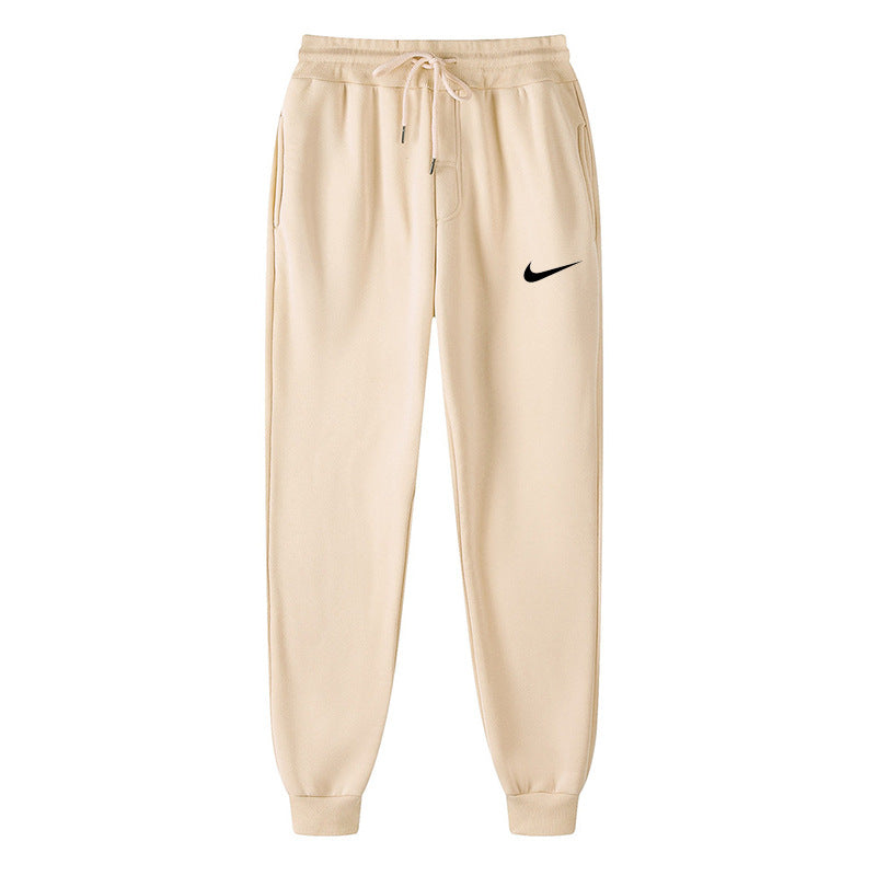 Black and white relaxed-fit cotton-blend joggers with drawstring waist