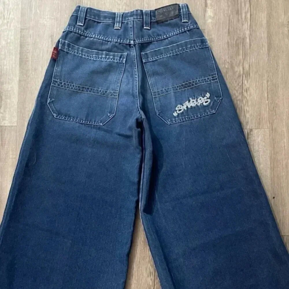 Baggy denim jeans with embroidered back pocket graphics