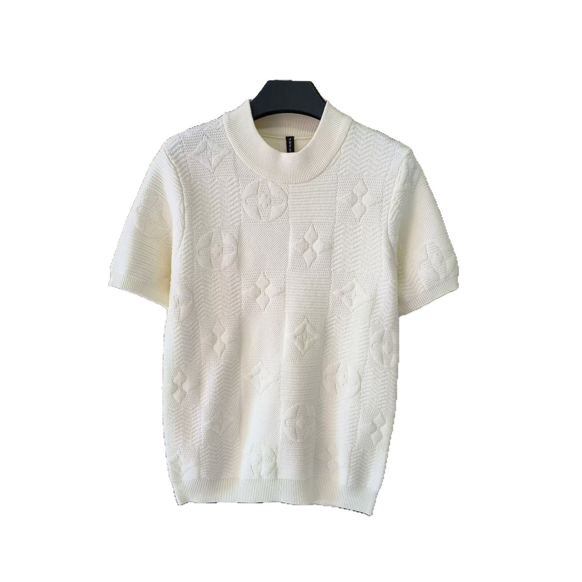 Cream short-sleeve knit sweater with embossed jacquard pattern