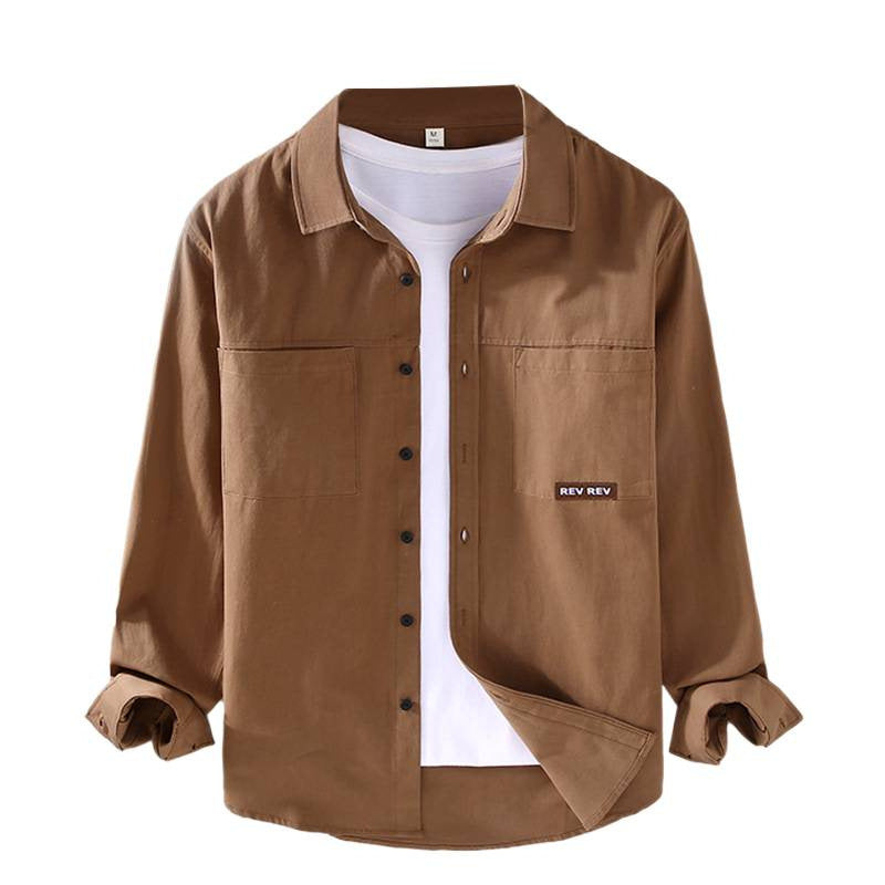 Beige long-sleeve cotton shirt with chest pockets and black buttons