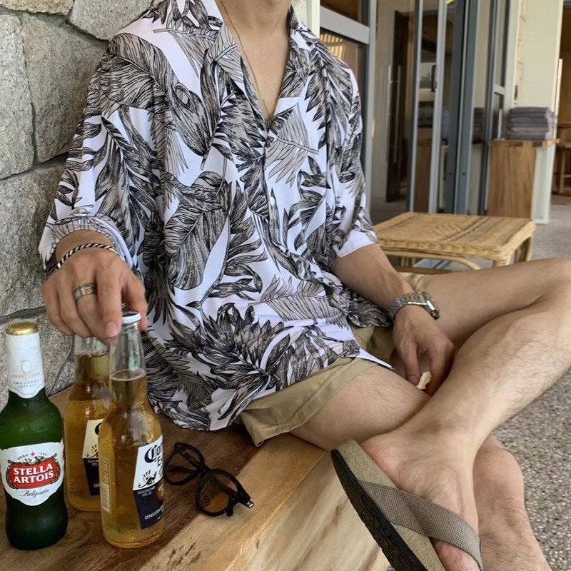 Tropical leaf print short sleeve button up shirt