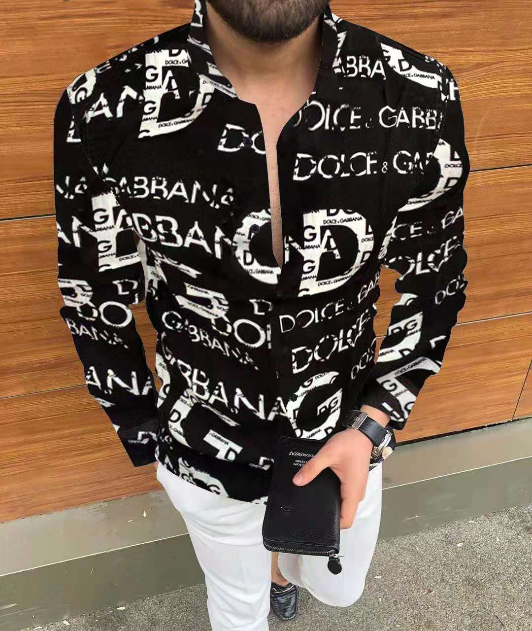 Black long-sleeve printed shirt with fragmented floral motif