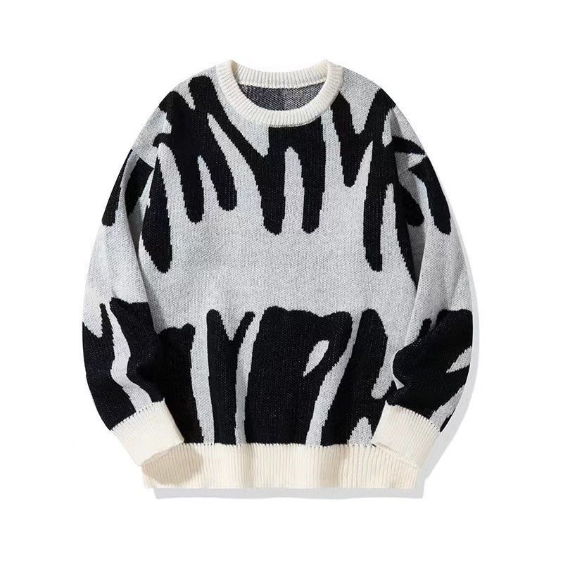 Jacquard knit sweater with abstract graphic and ribbed cuffs