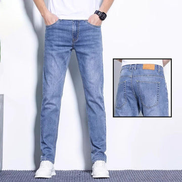 Lightweight stretch denim jeans with slim fit and tapered leg
