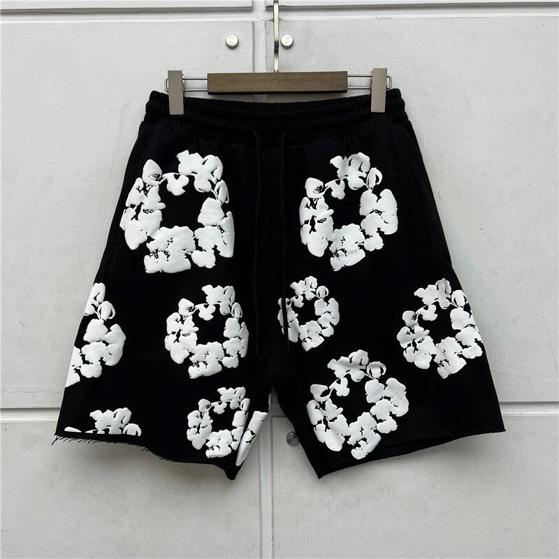 Classic gray cotton sweat shorts with 3D floral appliqué