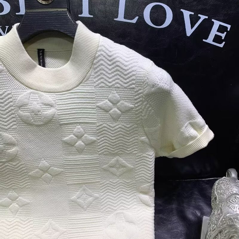 Cream short-sleeve knit sweater with embossed jacquard pattern
