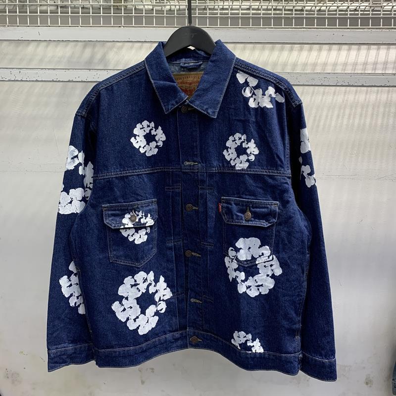 Denim Tears floral-embroidered slim-fit jeans