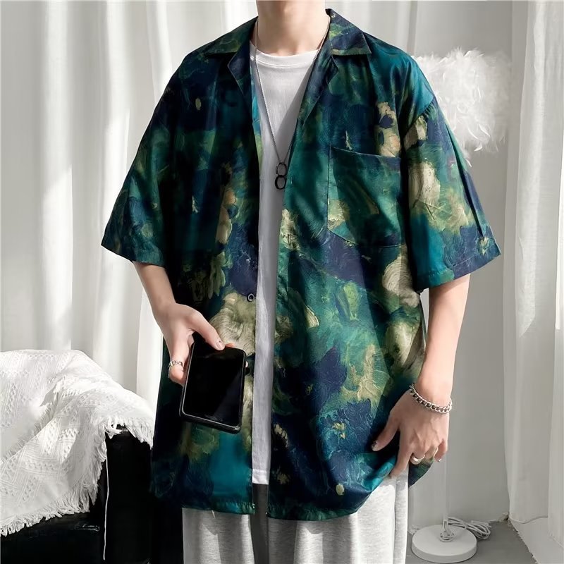 Tropical leaf print short sleeve button up shirt