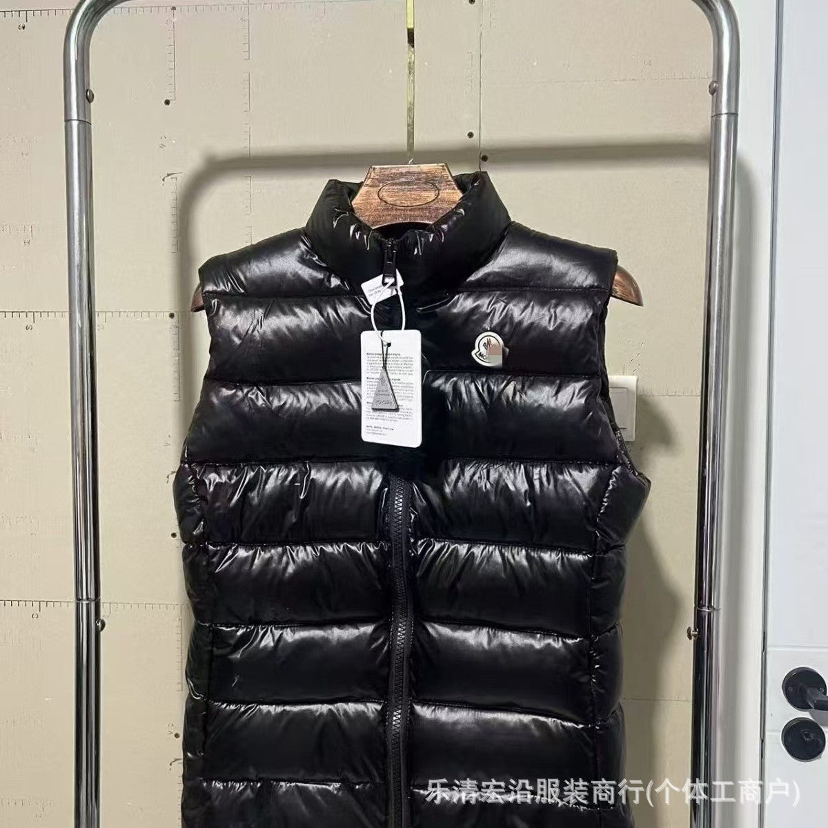 Ribbed Black Puffer Vest with Diagonal Zipper and Stand Collar