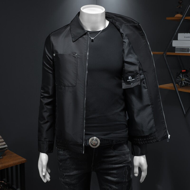 Black zip-front utility jacket with notched lapel and multiple pockets