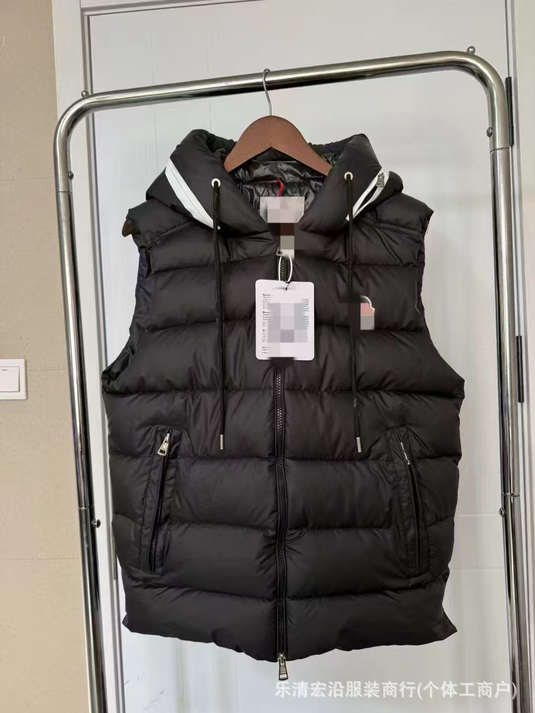Ribbed Black Puffer Vest with Diagonal Zipper and Stand Collar