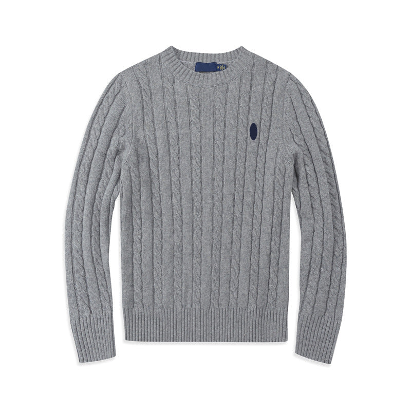 Cable-knit cotton crew neck sweater in solid color with contrasting embroidered polo motif