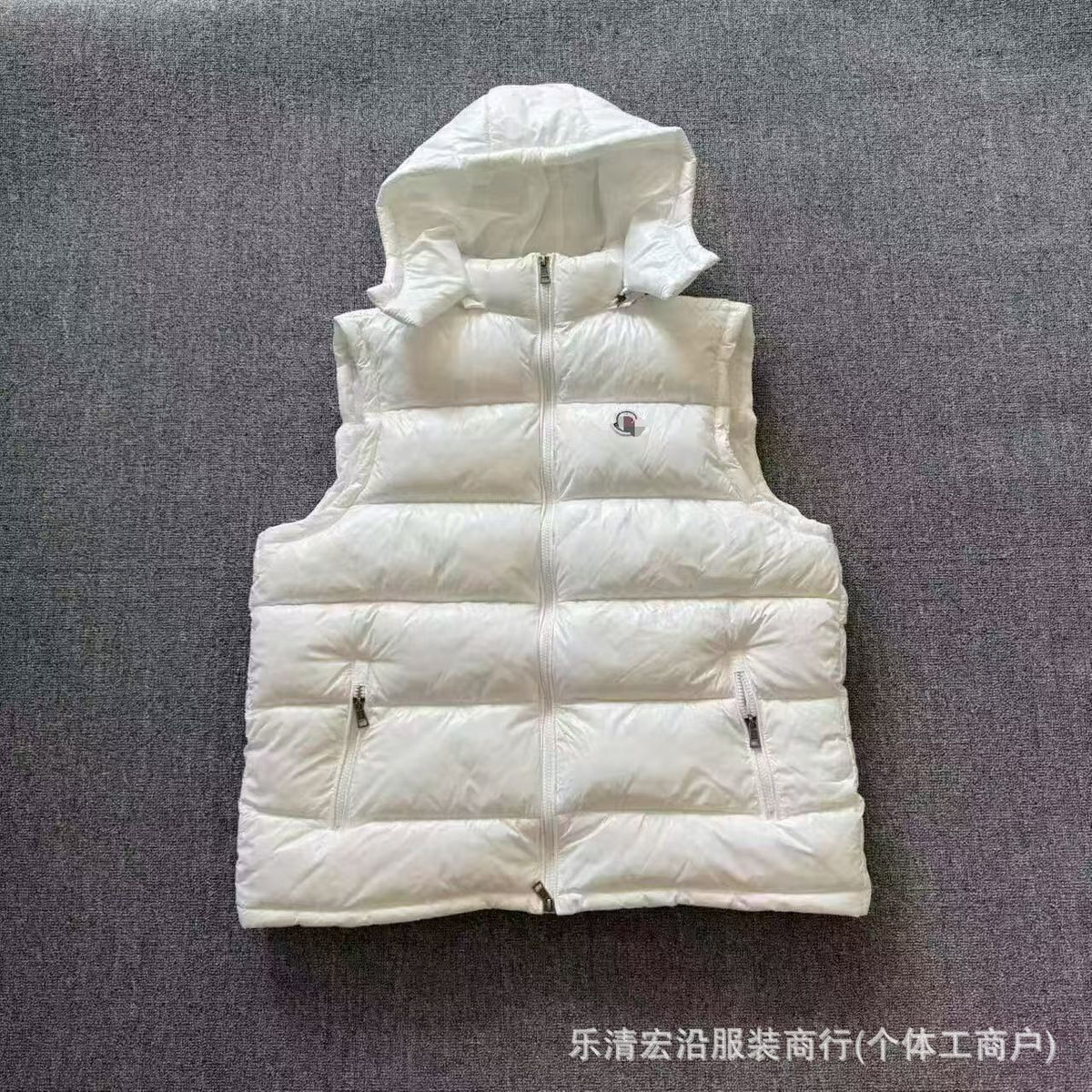 Ribbed Black Puffer Vest with Diagonal Zipper and Stand Collar