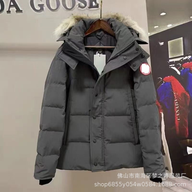 Black puffer coat with fur-trimmed hood and oversized pockets