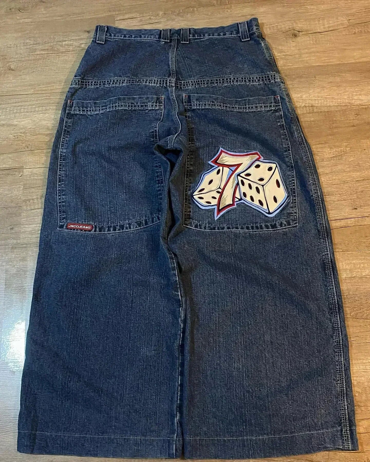 Baggy denim jeans with embroidered back pocket graphics