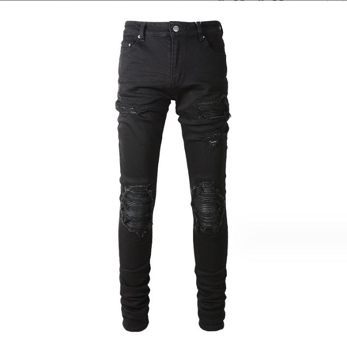 Black distressed slim-fit jeans with knee rips and patch details