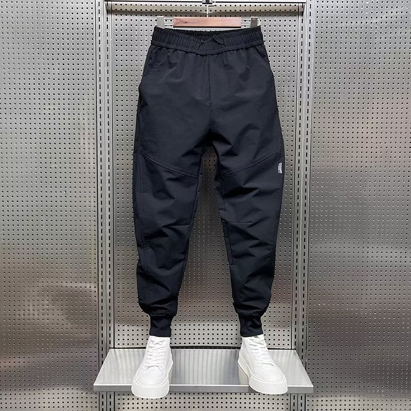 Black cargo joggers with elastic waist and side pockets