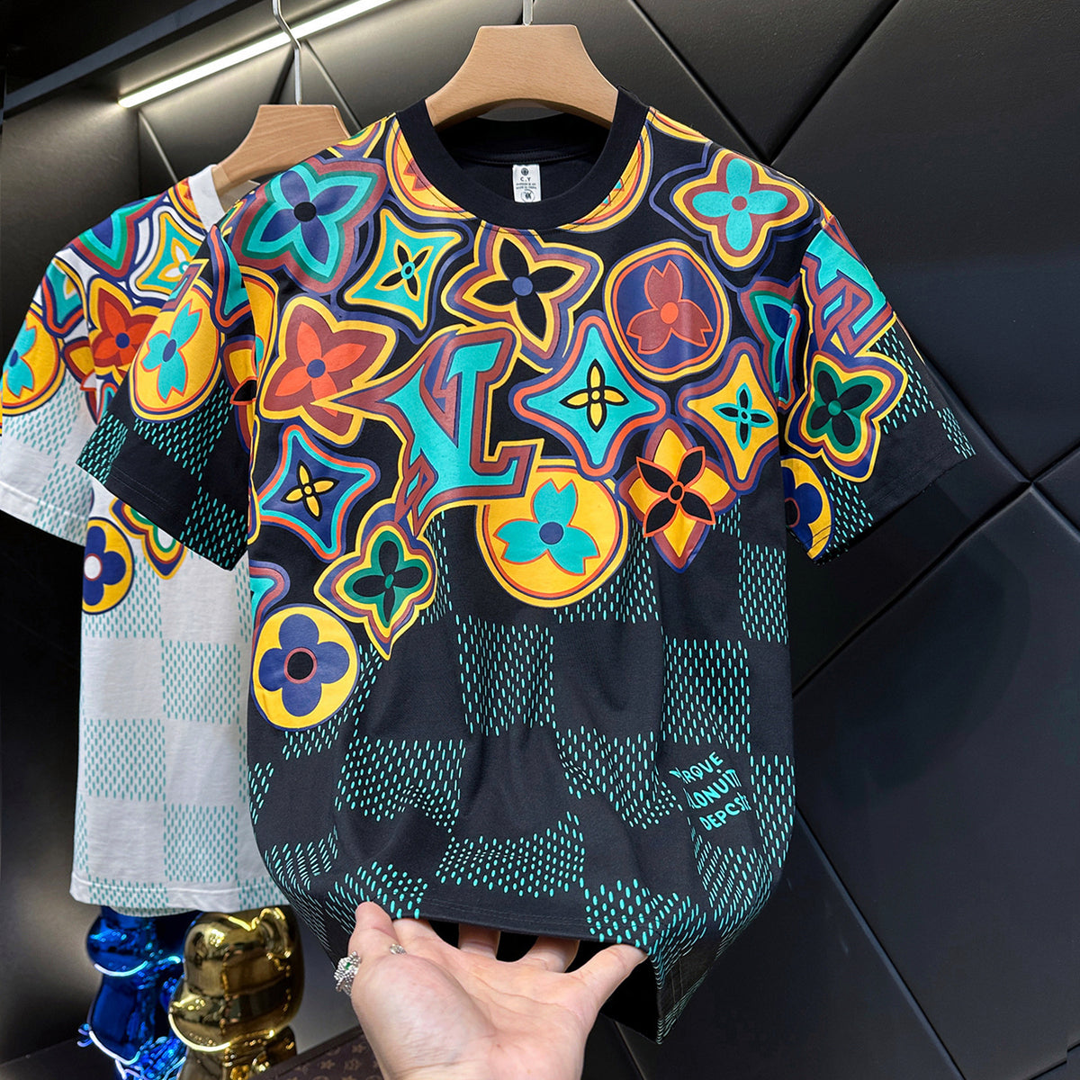 Men's Short-Sleeve Crewneck T-Shirt with Colorful Floral & Geometric Allover Print, Orange Collar Trim, Cream Base