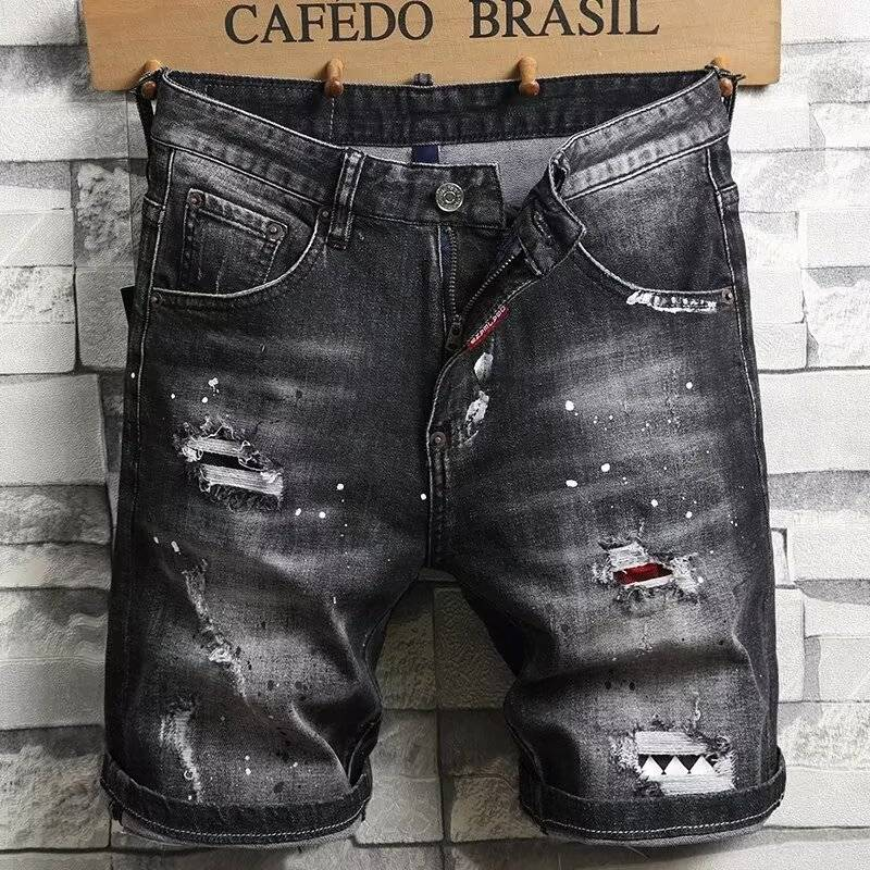Black Paint-Splattered Denim Shorts with Rips and Patches