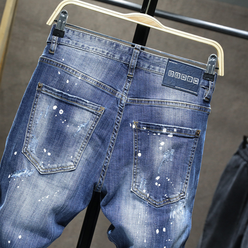 Distressed Skinny Jeans with Paint Splatter Detail