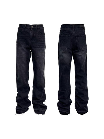 Distressed flared jeans with frayed hem and vintage grey wash