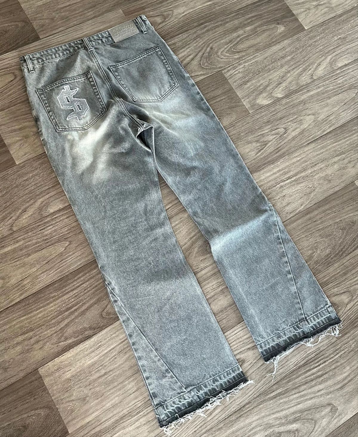 Black Slim-Fit Stretch Denim Jeans with Raw Hem