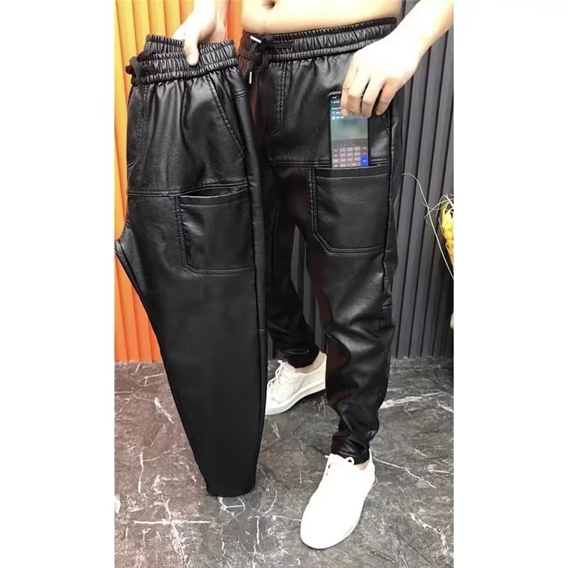 Black faux leather joggers with elastic waistband
