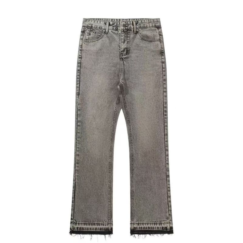 Distressed flared jeans with frayed hem and vintage grey wash
